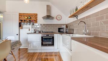 Microwave, oven, cookware/dishes/utensils