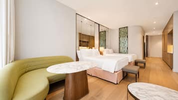Appartement Deluxe, balcon | Coffres-forts dans les chambres, rideaux occultants