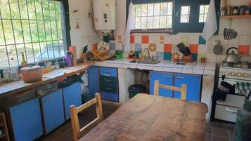 Fridge, oven, cookware/dishes/utensils
