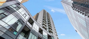 Modern High Rise Condo w Private Patio—Downtown