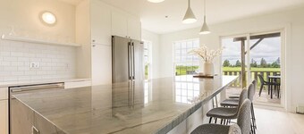 Luxury Bay View Escape 4BR Near Beaches & Golf