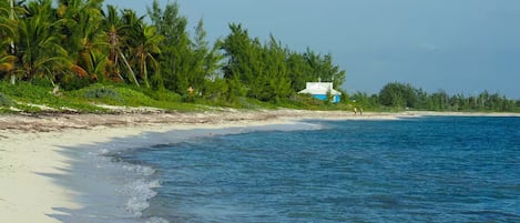 On the beach, sun loungers, beach towels