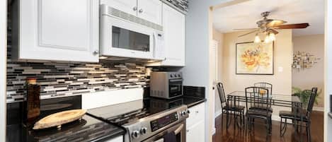 Coffee/tea maker, fridge, microwave, oven