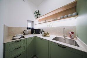 Appartement (2 Bedrooms) | Cuisine privée | Micro-ondes, plaque de cuisson, lave-vaisselle, machine à expresso