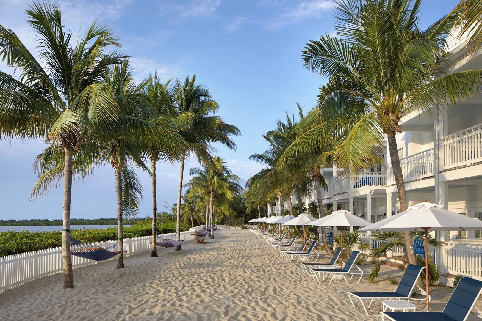 Stretch out on shaded loungers just steps from the water.