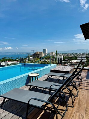 Outdoor pool - Private Full-Floor Ocean View Condo • Rooftop Pool • Walk to Beach (Puerto Vallarta)