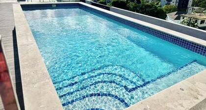 2BDRM • 24hrs Security • Top floor with Mountain View • Rooftop Pool and Gym