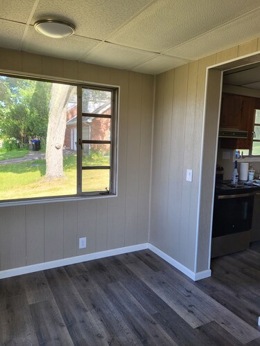  2-bed historic Lustron home newly remodeled, modern interior. Nearby shopping!