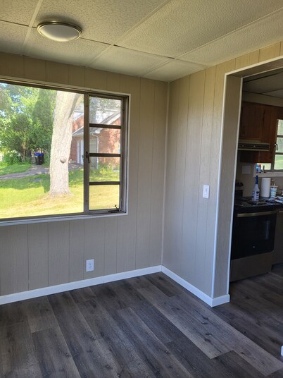  2-bed historic Lustron home newly remodeled, modern interior. Nearby shopping!