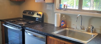 2-bed historic Lustron home newly remodeled, modern interior. Nearby shopping!
