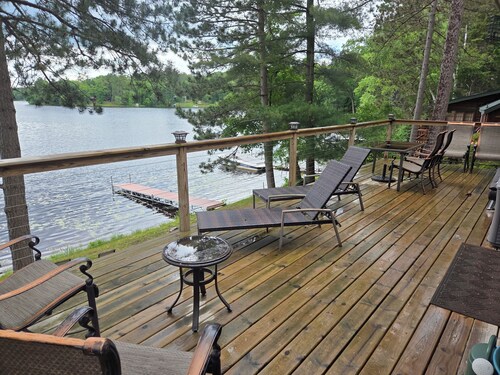 Awesome lakefront 3-bedroom cabin with guest cabin.  3 Queen beds + 2 futons.