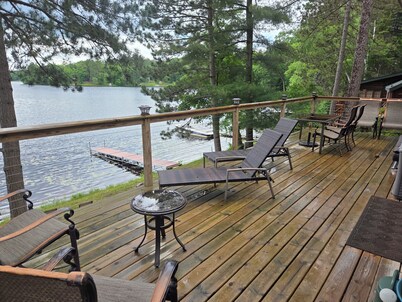 Awesome lakefront 3-bedroom cabin with guest cabin. 3 Queen beds + 2 futons.