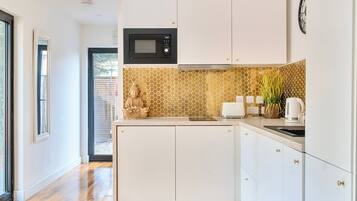 Fridge, microwave, stovetop, electric kettle