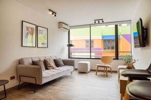 Familienapartment, Balkon | Wohnbereich