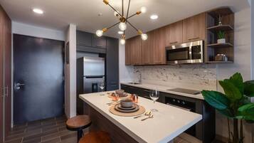 Fridge, microwave, coffee/tea maker, toaster