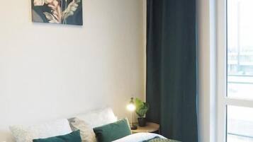 Blackout drapes, soundproofing, iron/ironing board, free WiFi