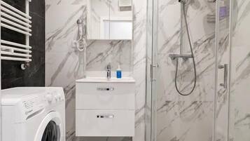 Shower, free toiletries, hair dryer, towels