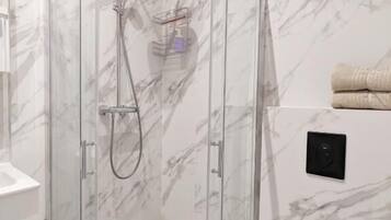 Shower, free toiletries, hair dryer, towels
