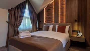 Habitación doble | Minibar, caja fuerte, wifi gratis y ropa de cama