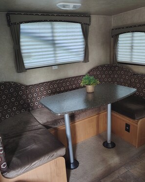 Dining - Little Mt. Retreat Camper with Water, Sewage, AC, and Limited Internet (DeFuniak Springs)
