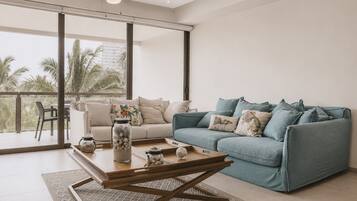 Deluxe-Loft, Balkon, Poolblick | Wohnbereich