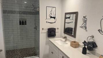 Hair dryer, towels, soap, toilet paper