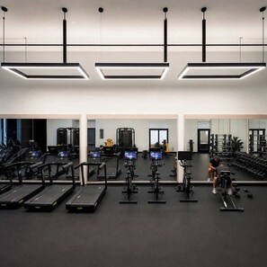 A gym with treadmills, weight machines, and free weights. - Prime Miami Luxury Unit | King Bed | Sleeps 2 (Miami)