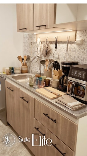 Family Apartment, Multiple Beds, Kitchen | Private kitchen | Coffee/tea maker, oven, stovetop, blender - Suite Elite Valledupar (Valledupar)