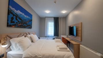 Down comforters, pillowtop beds, in-room safe, individually decorated