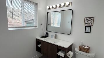 Hair dryer, towels, soap, toilet paper