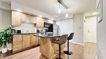 Elite Apartment, Multiple Beds, Non Smoking, Private Bathroom | Private kitchen | Coffee/tea maker, full-sized fridge, microwave, oven