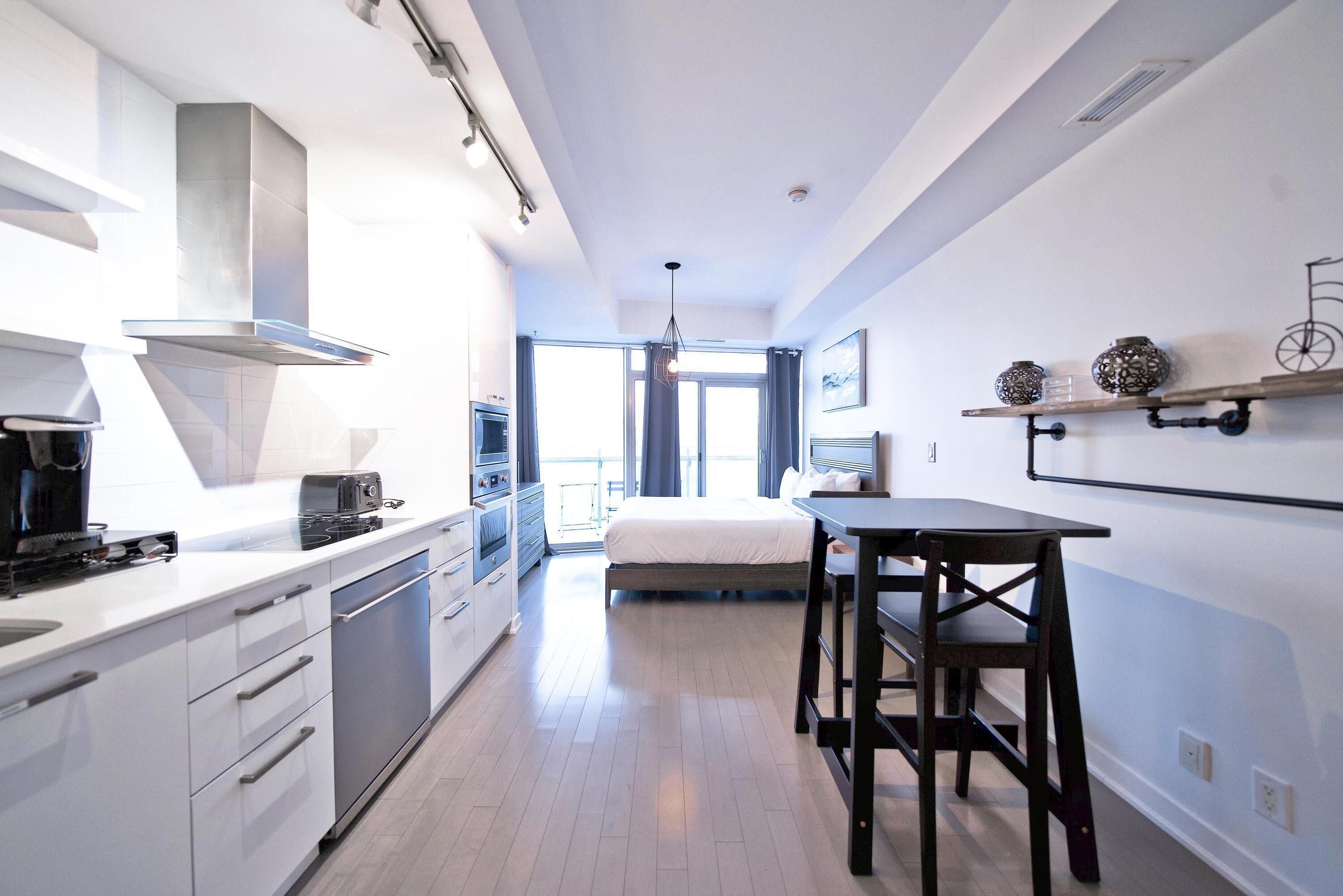 Classic Studio Suite, 1 Queen Bed with Sofa bed, Non Smoking, Private Bathroom | Living area | 50-inch TV with digital channels