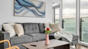 Design Apartment, 2 Bedrooms, Non Smoking, Private Bathroom | Living area | 50-inch TV with digital channels
