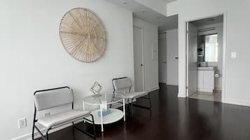 Basic Studio Suite, 1 Queen Bed, Non Smoking, Private Bathroom | Living area | 50-inch TV with digital channels