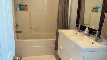 Hair dryer, towels, soap, shampoo
