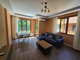 Apartamento, 2 quartos, sacada, vista para a cidade | Área de estar