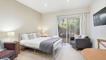 Iron/ironing board, travel cot, bed sheets
