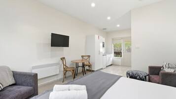 Iron/ironing board, travel crib, bed sheets