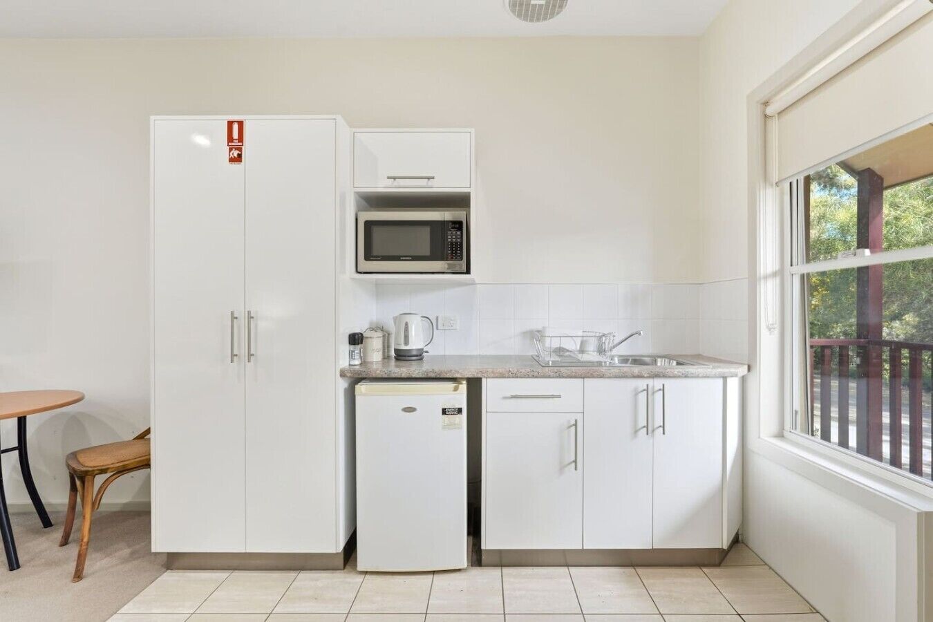 Microwave, toaster, high chair, cookware/dishes/utensils