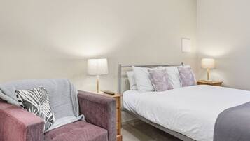 Iron/ironing board, travel cot, bed sheets