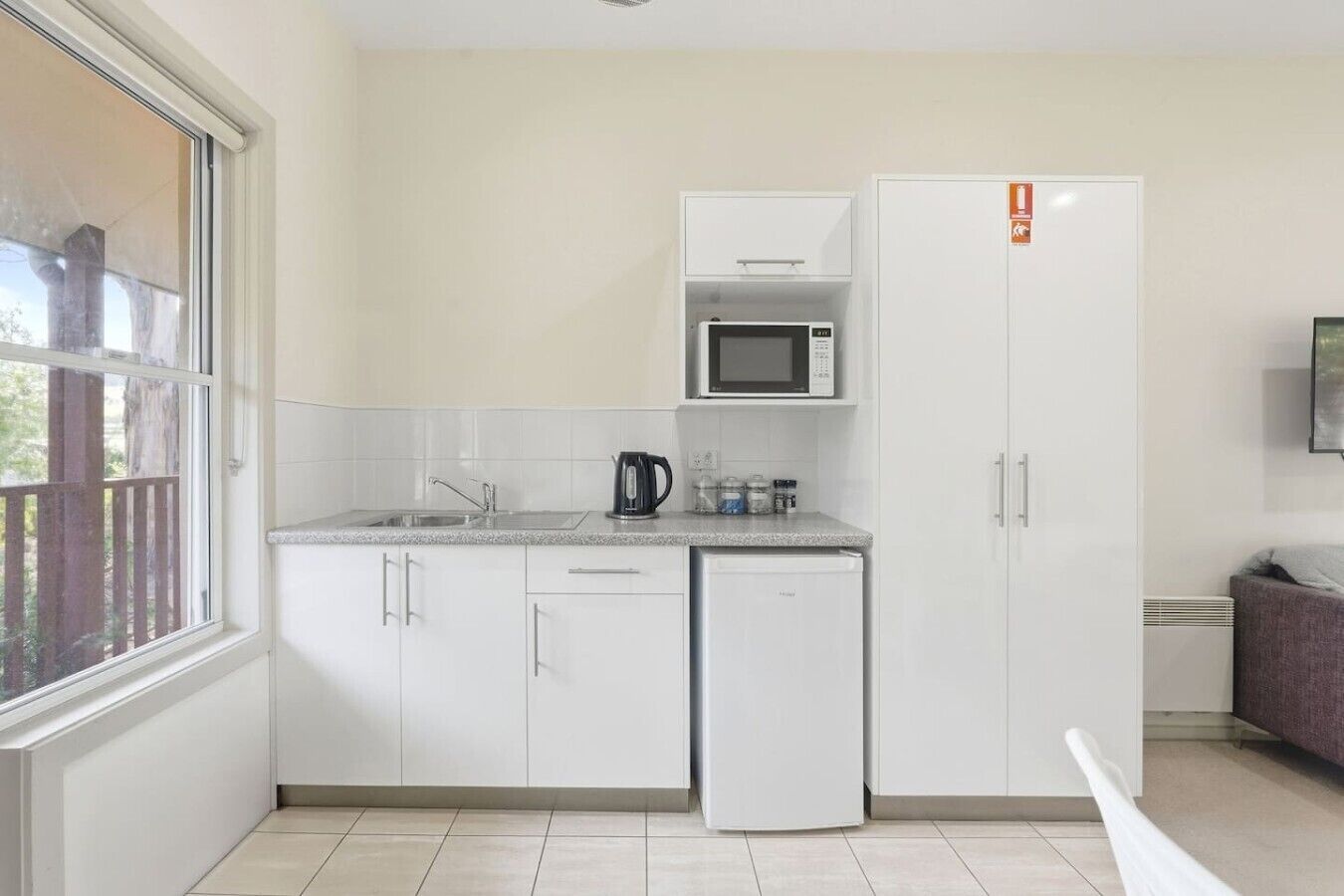 Microwave, toaster, high chair, cookware/dishes/utensils