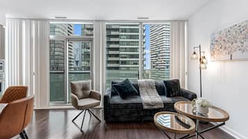 Standard Apartment, 1 Bedroom, Non Smoking | Living area | 50-inch TV with digital channels