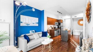 Deluxe Apartment, Balcony, City View | Living area
