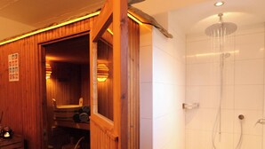 A wooden interior with a shower area, including a showerhead and a tiled wall. - Azur Appartement/Fewo 2-Bettwohnung Nr. 3 by Interhome (Saas-Fee)