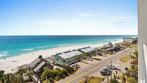 A coastal town with a beach, buildings, and a road. - 805 Gulf Front Views & Rare Gulf Front Pool ~ Gorgeous 2-bdm ~ Book Sept 28th (Destin)