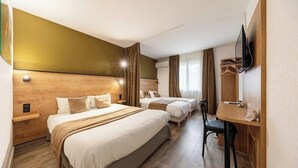 A hotel room with a large bed, a smaller bed, a desk, and a TV mounted on the wall. - Hotel Azur (Fos-sur-Mer)