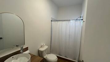 Hair dryer, towels, soap, toilet paper
