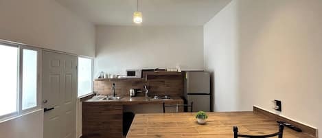 Coffee/tea maker, microwave, cookware/dishes/utensils