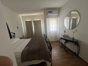 2 dormitorios, tabla de planchar con plancha, wifi gratis y ropa de cama