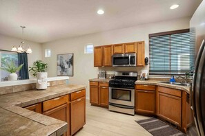 Coffee/tea maker, fridge, microwave, oven - Relax, Shop & Explore from Updated Woodburn Home, Next to Outlets, Pet Friendly, Fenced Backyard (Woodburn)